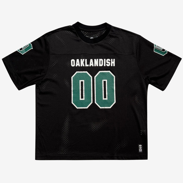Black mesh football jersey with 00 green numbers and large white Oaklandish wordmark.