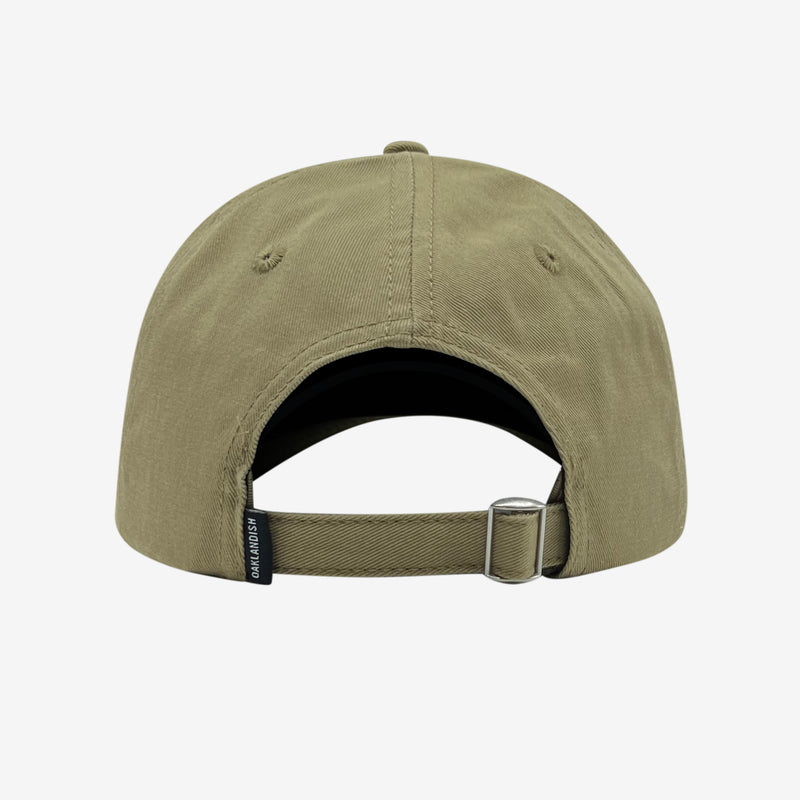 Back of khaki dad hat with adjustable strapback and Oaklandish woven label.