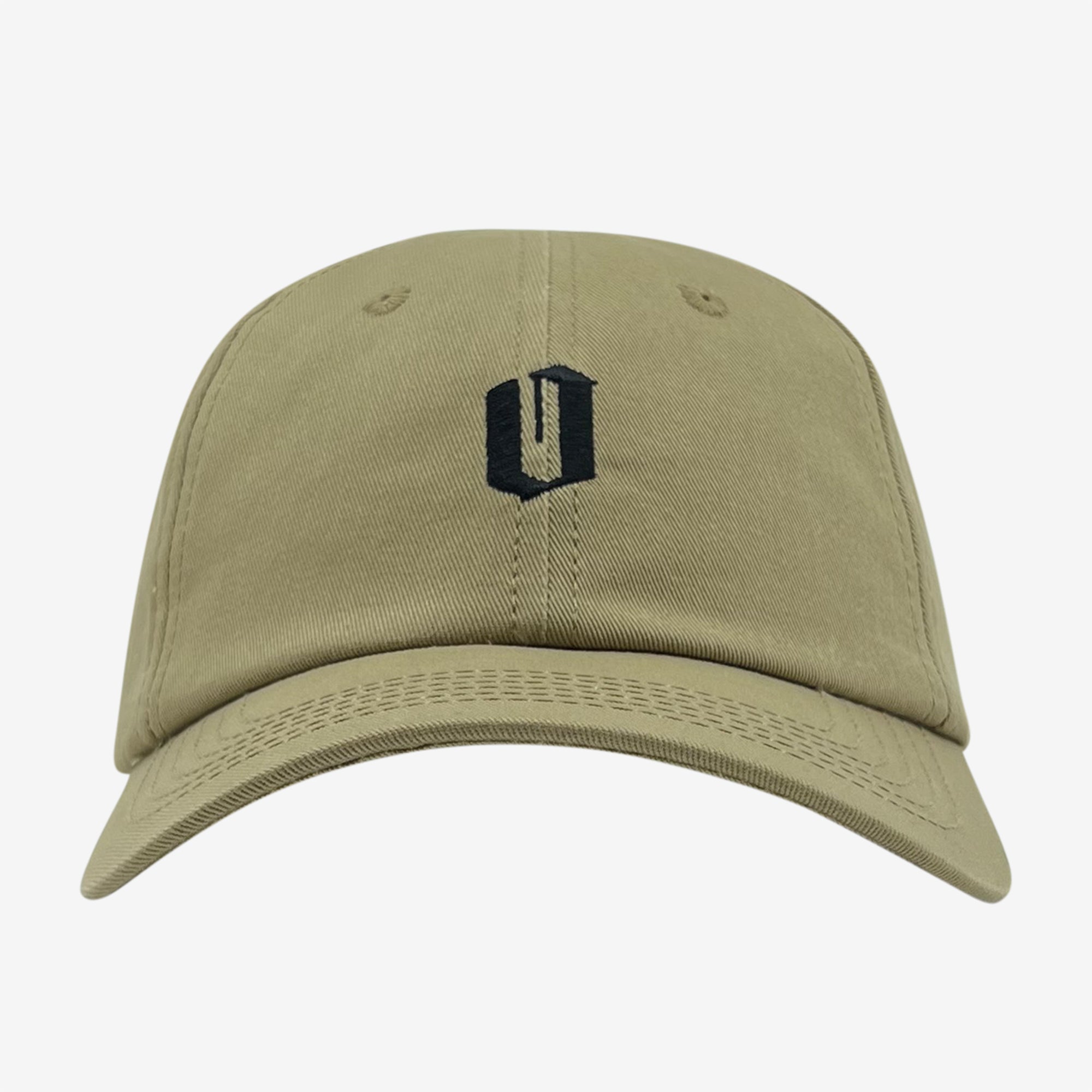 An Official Micro Logo Dad Hat from Oaklandish with a curved brim is centered in the image. The khaki-colored cap features an embroidered black "U" logo on the front and an adjustable strap at the back. The plain white background highlights the details and color of this stylish hat.