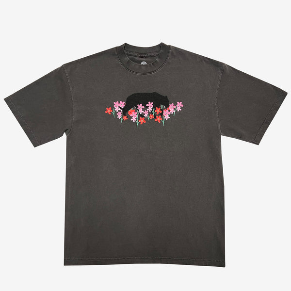 Vintage black t-shirt with artistic bear and flower design created by artist Ant Bankxin.