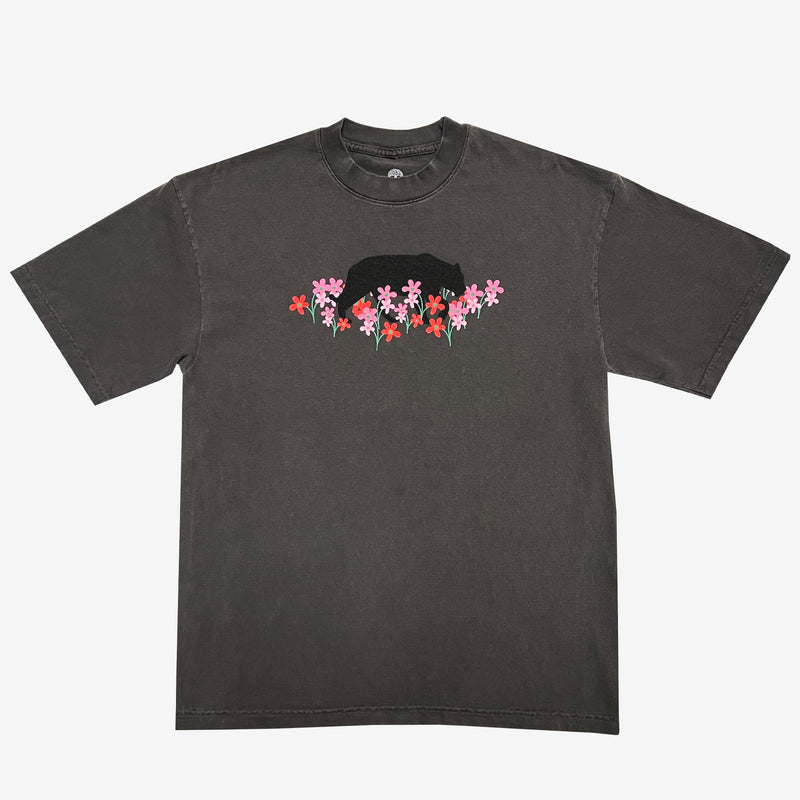 Vintage black t-shirt with artistic bear and flower design created by artist Ant Bankxin.