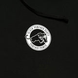 Detailed close-up of small white Black Panther Party Alumni Legacy Network logo on the chest of a black hoodie.