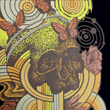 Detailed close-up of swirl design symbolizing rebirth featuring butterflies with a skull at the center on a black cotton t-shirt.