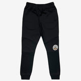 Black joggers with round color Oakland SC club logo on left wear side leg.