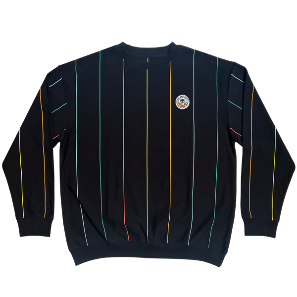 Flat lay of a black crewneck sweatshirt with multicolor pinstripes and Oakland Roots SC crest on wearer's left chest.