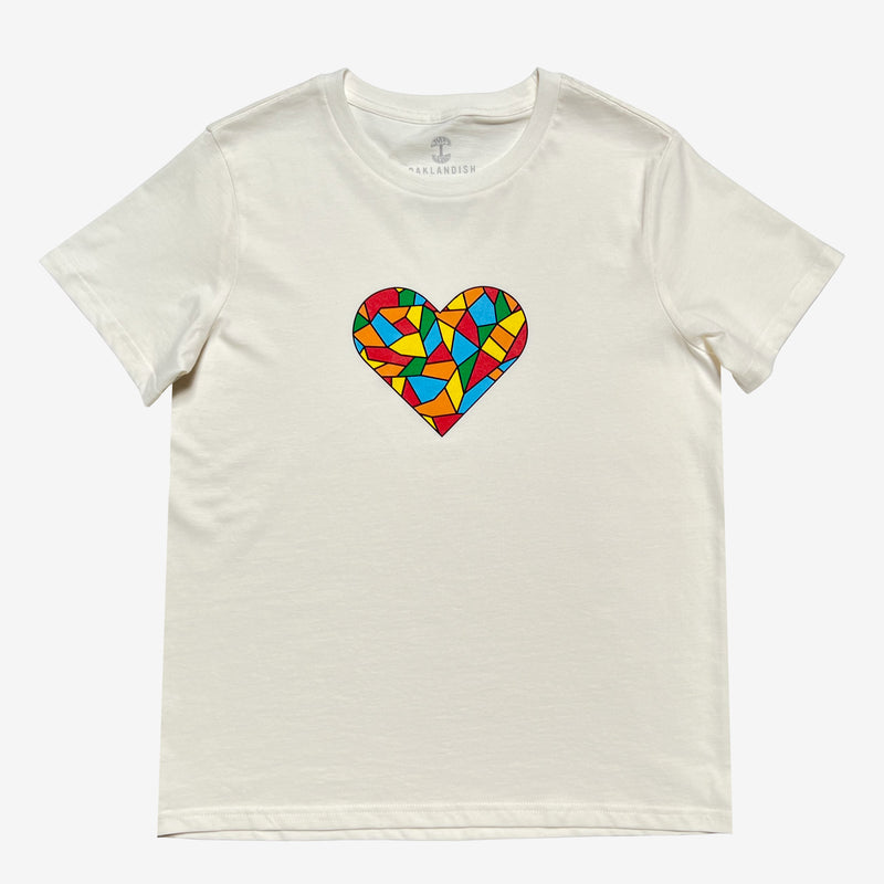 Natural cotton t-shirt with full-color Roots mosaic logo colors in a heart shape on chest.