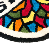 Detailed close up image of round area rug with Oakland Roots SC crest in full color.