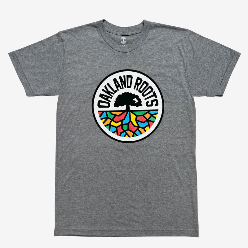  Athletic grey t-shirt with full-color, round Oakland Roots logo on the chest.