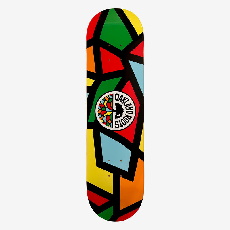 Skateboard deck with full-color Roots Soccer Club mosaic colors and round logo mark.
