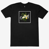 Black t-shirt with a graphic of yellow sticky monkey flowers overlaid with cursive Oakland wordmark in a white square.