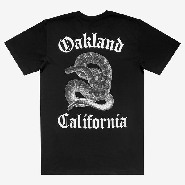 Back image of men's black t-shirt with detailed snake graphic between 'Oakland California'.