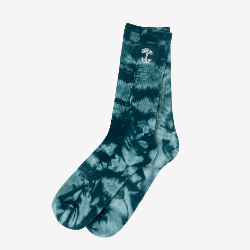 Two nestled high-cut light and dark blue crew socks with an embroidered Oak logo detail.