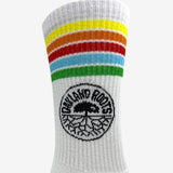 Close up of Oakland Roots Soccer Club colored stripes & logo on top sides of white crew socks.