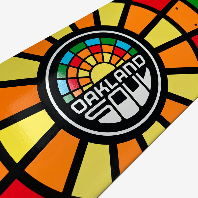 Detailed close-up of full-color Oakland Soul round logo on a skateboard deck.