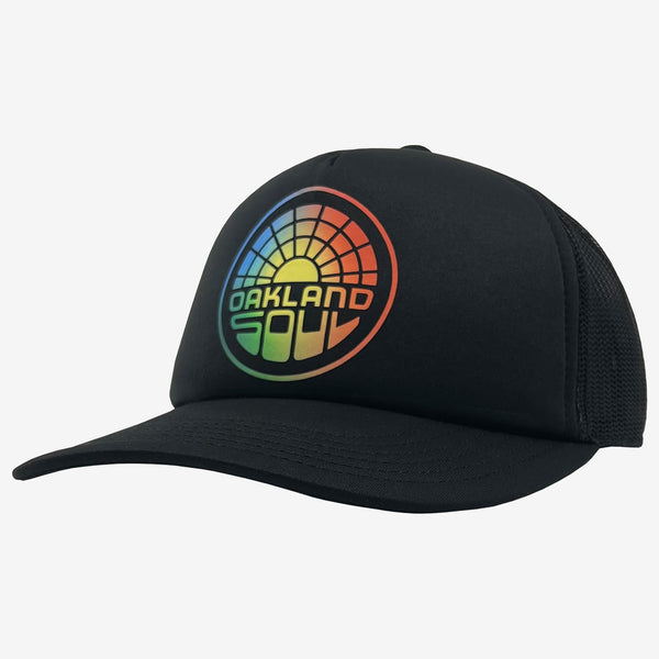 Side view of black low profile black foam trucker hat with color iridescent Oakland Soul logo.