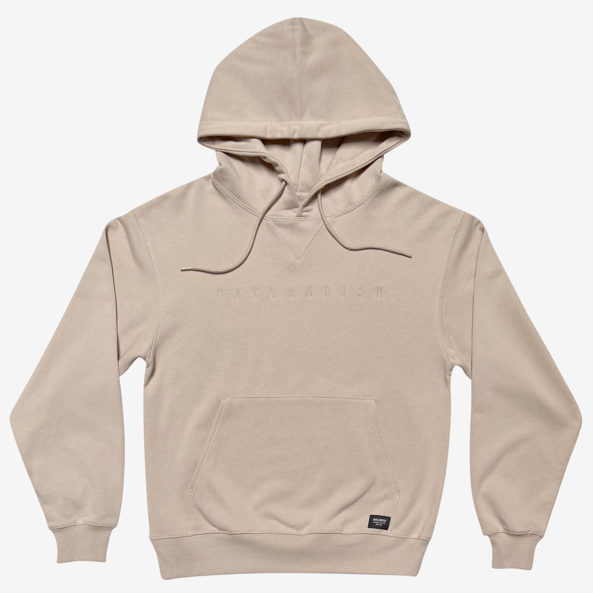 Sand-colored pullover hoodie with monochromatic Oaklandish wordmark embroidered on the chest.