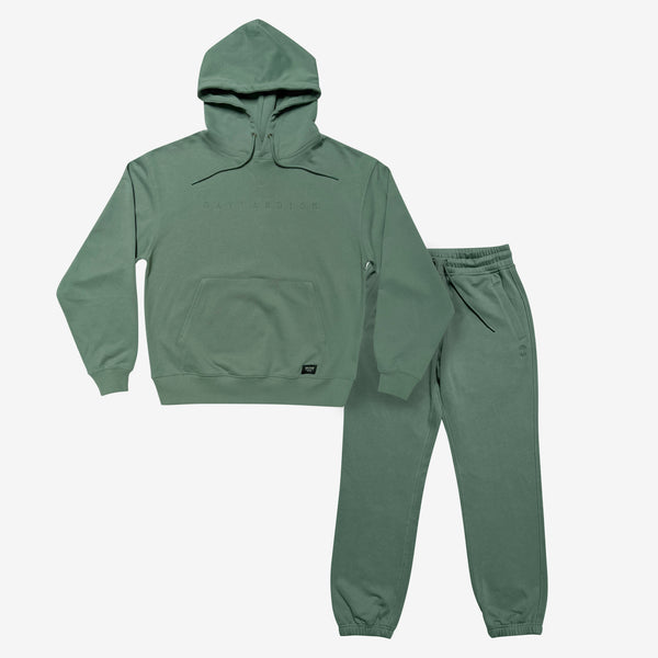 Olive hoodie and jogger set with Oaklandish monochromatic embroidered across the hoodie chest and Oaklandish tree embroidered under the left pocket of joggers.