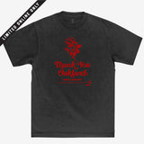 Black t-shirt with red graphic of a flower with the words “Thank-You Oakland. Have a Nice Day.”
