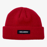 Burgundy shorter style cuff beanie with white Oaklandish wordmark on cuff patch.