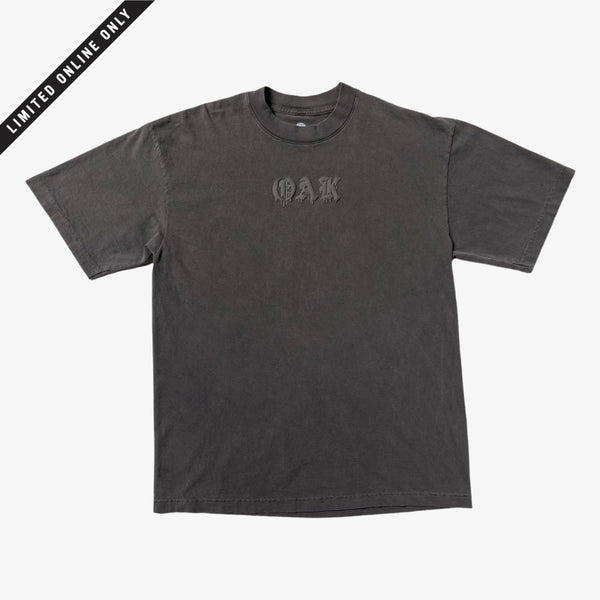 Vintage black t-shirt with black OAK wordmark in old style font with a bleed. l