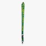 Green lanyard with yellow Oaklandish word mark and tree logos on repeat with a detachable clip with Oaklandish tree logo.