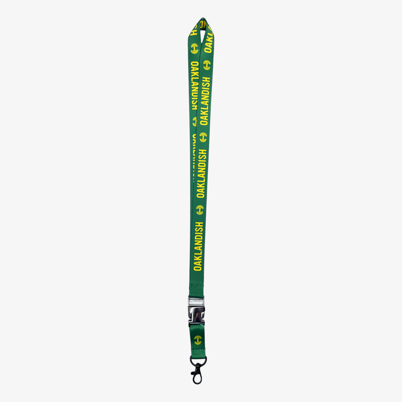 Green lanyard with yellow Oaklandish word mark and tree logos on repeat with a detachable clip with Oaklandish tree logo.