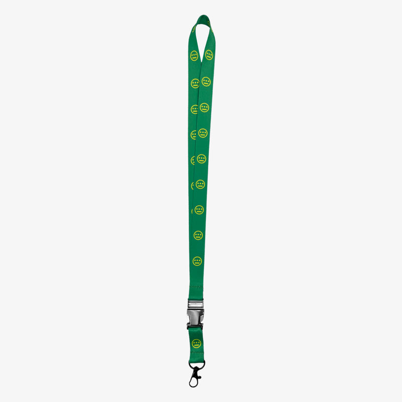 Green quick release lanyard with yellow Hieroglyphics hip-hop logo on repeat. 