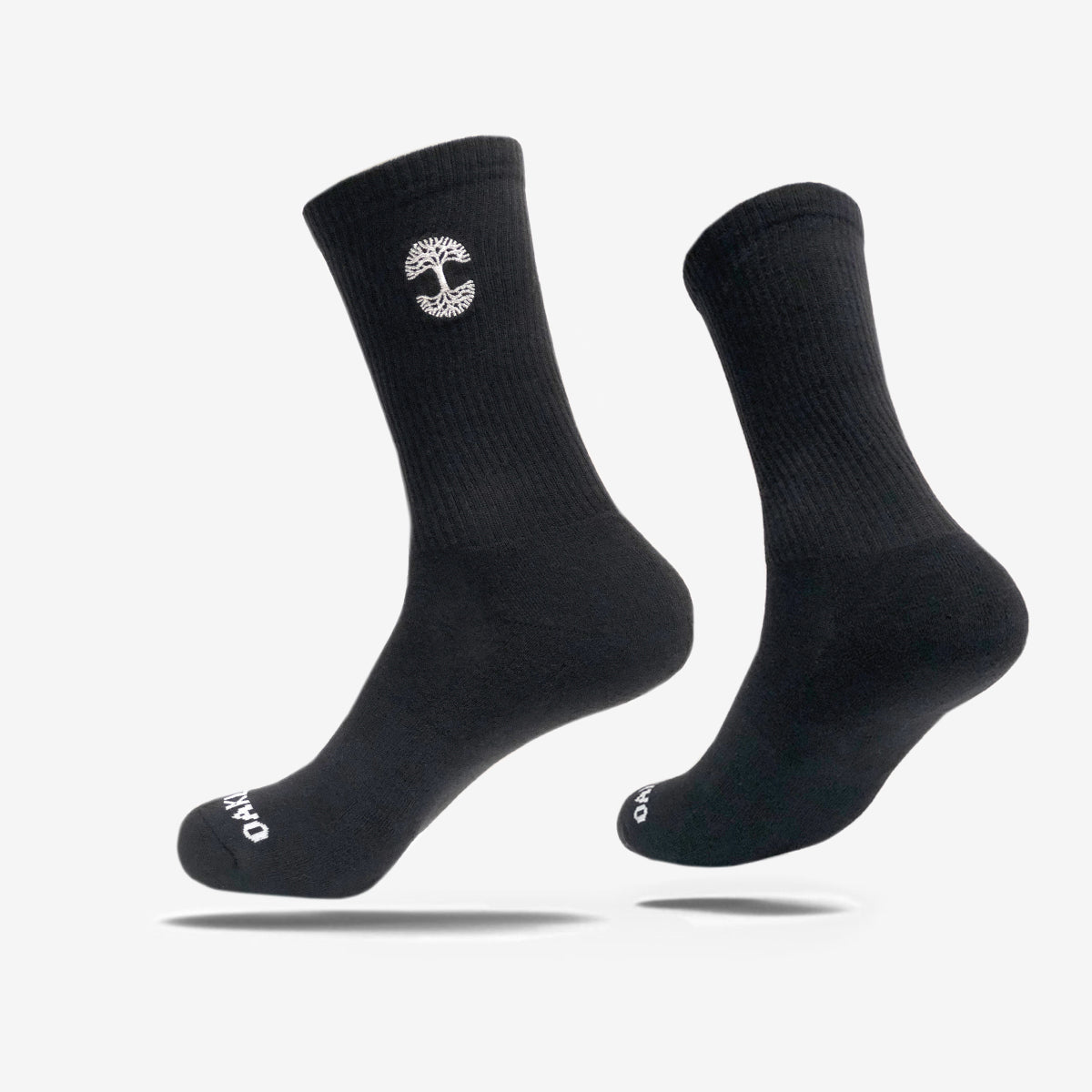 High-cut men's black crew socks with white embroidered Oaklandish logo at the top.
