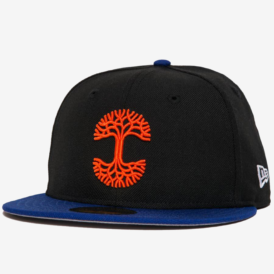 Black New Era cap with blue bill and a red embroidered Oaklandish tree logo on the crown.