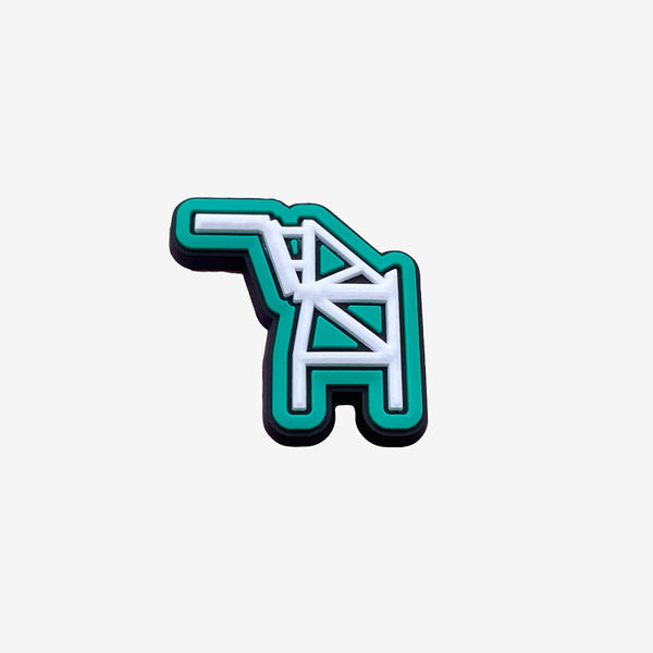 Shoe charm with an Oakland crane outlined in white on a green background.