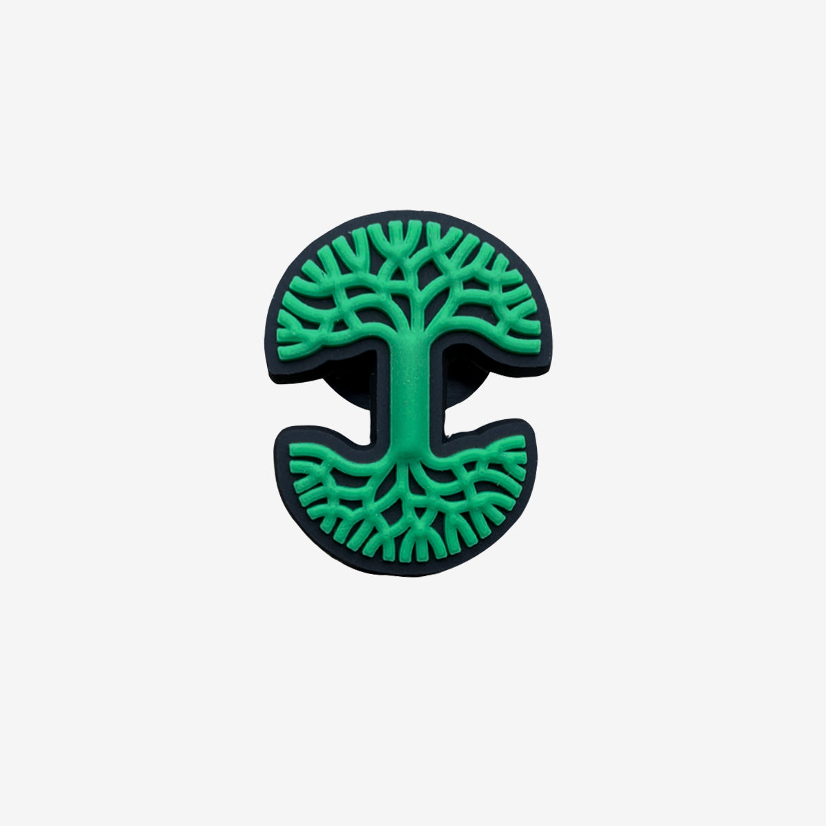 Green and black Oaklandish tree logo shoe charm. 