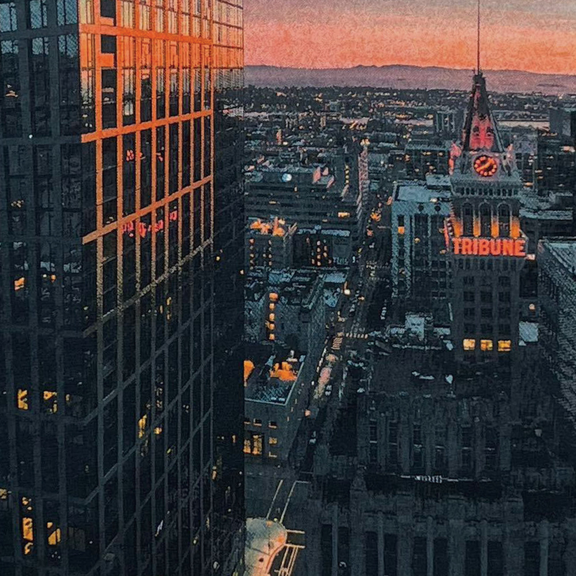 Detailed close up image of black t-shirt with Vincent James photography image of the Oakland Tribune building and the Downtown Oakland landscape.