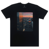 Flat image of black t-shirt with Vincent James photography image of the Oakland Tribune building and the Downtown Oakland landscape.