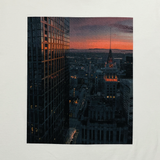 Close up image of natural colored t-shirt with Vincent James photography image of the Oakland Tribune building and the Downtown Oakland landscape.