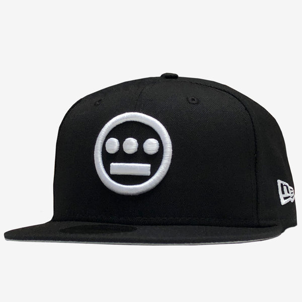 Black cap with white embroidered Hieroglyphics hip-hop logo on the crown and New Era logo on the side.