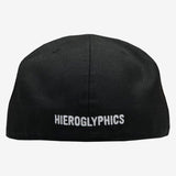 The backside of a black fitted cap with white embroidered HIEROGLYPHICS wordmark.