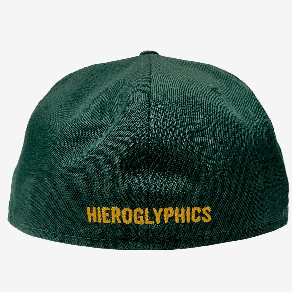 The backside of a green fitted cap with a gold embroidered HIEROGLYPHICS wordmark.
