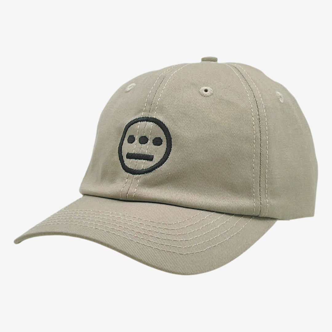 Side view of khaki dad cap with black embroidered Hiero hip-hop crew logo on crown. 