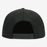 The backside of a black cap with plastic snapback closure.