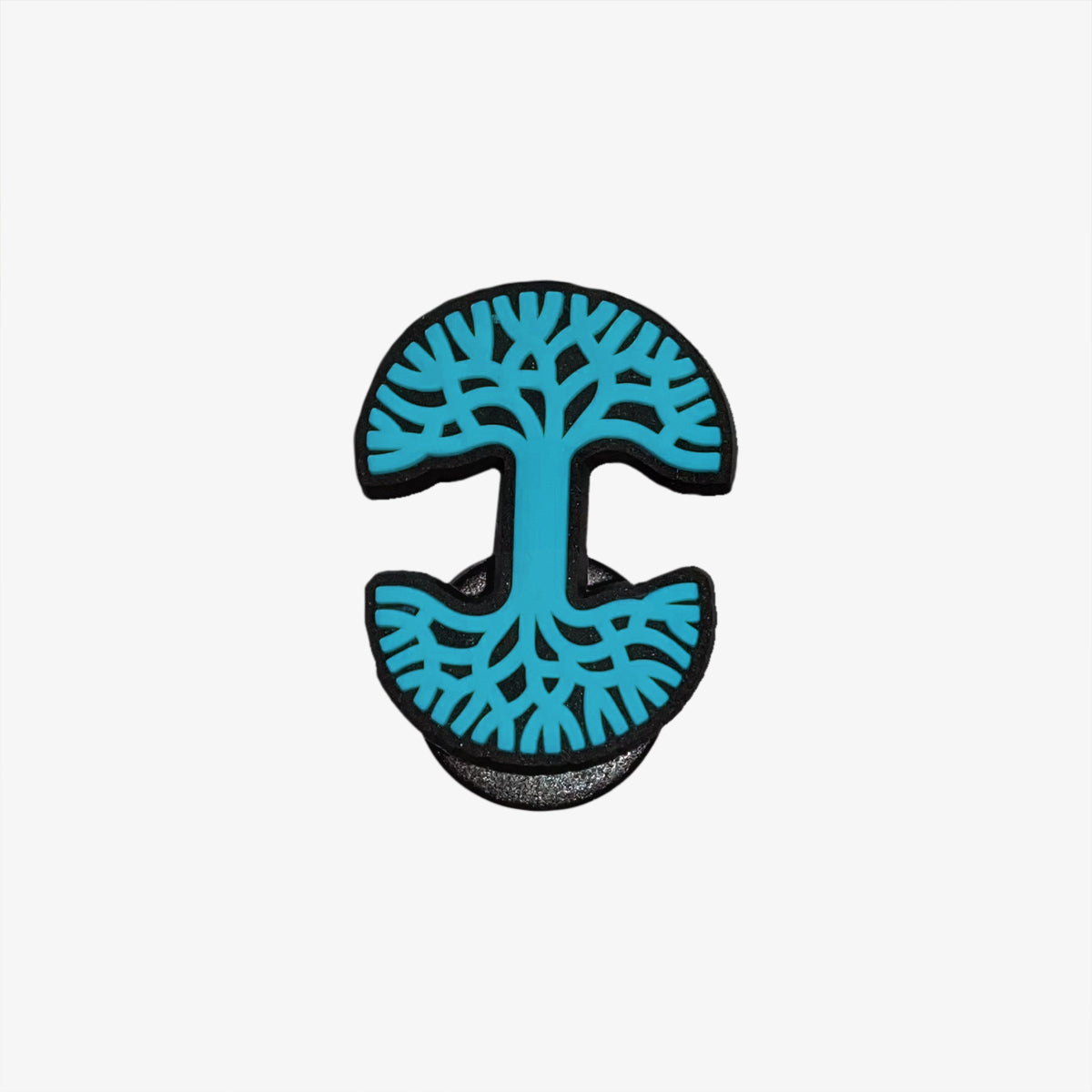 Teal and black Oaklandish tree logo shoe charm. 