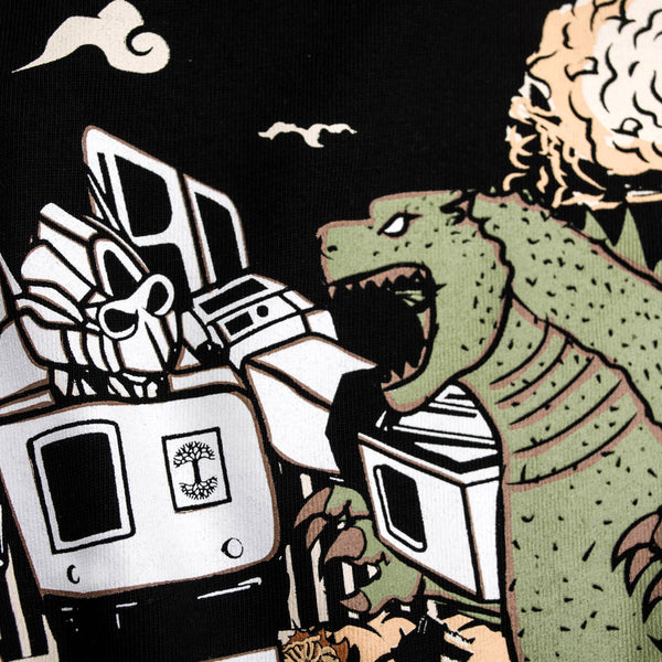 Close-up of graphic depiction of Kaiju vs. Autobart monsters invading Oakland on a black t-shirt. 
