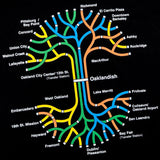 Close up a full-color BART transit map in the shape of the Oaklandish tree logo on a black t-shirt.