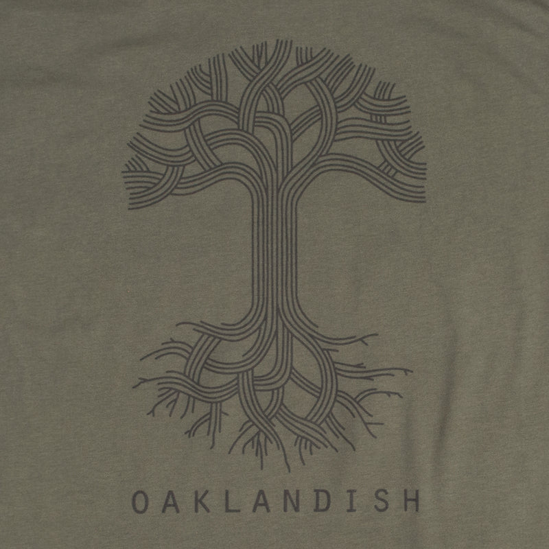 Close-up of a large black Oaklandish tree logo and wordmark on the chest of an army green t-shirt.