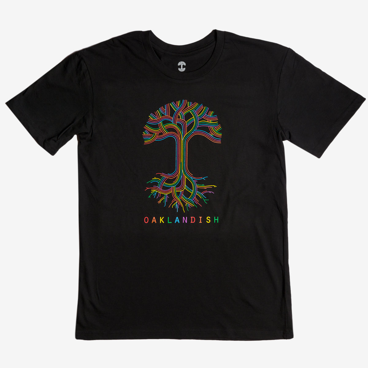 Black t-shirt with an outline of Oaklandish tree logo in rainbow colors and rainbow Oaklandish wordmark.
