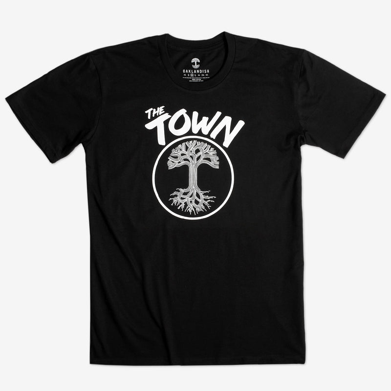 Black t-shirt with words The Town and Oaklandish tree logo in a circle underneath.
