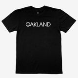 Black t-shirt with white OAKLAND wordmark with Hieroglyphics hip-hop crew logo as the O. 
