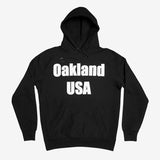 Black hoodie with large white Oakland USA wordmark logo on the chest.