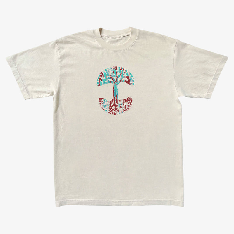 Creme t-shirt with large Oaklandish tree logo in indigo and red marbled ink on the chest.