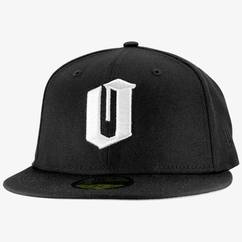 New Era 9FIFTY black cap with white embroidered O for Oakland. Tilted to see New Era logo on left wear side.