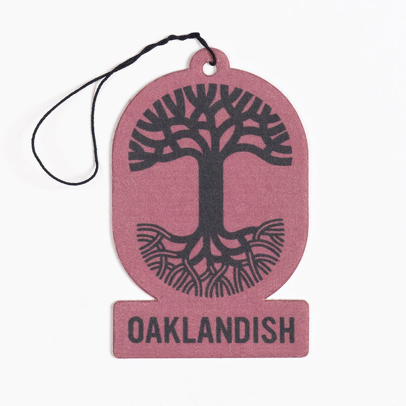 Burgundy felt air freshener with the Oaklandish tree logo and wordmark.